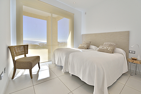 bedroom with view outside benalmadena luxury villas