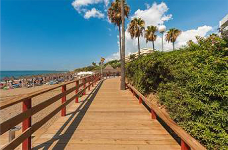 view of boardwalk image of firstline beach apartment in mijas costa