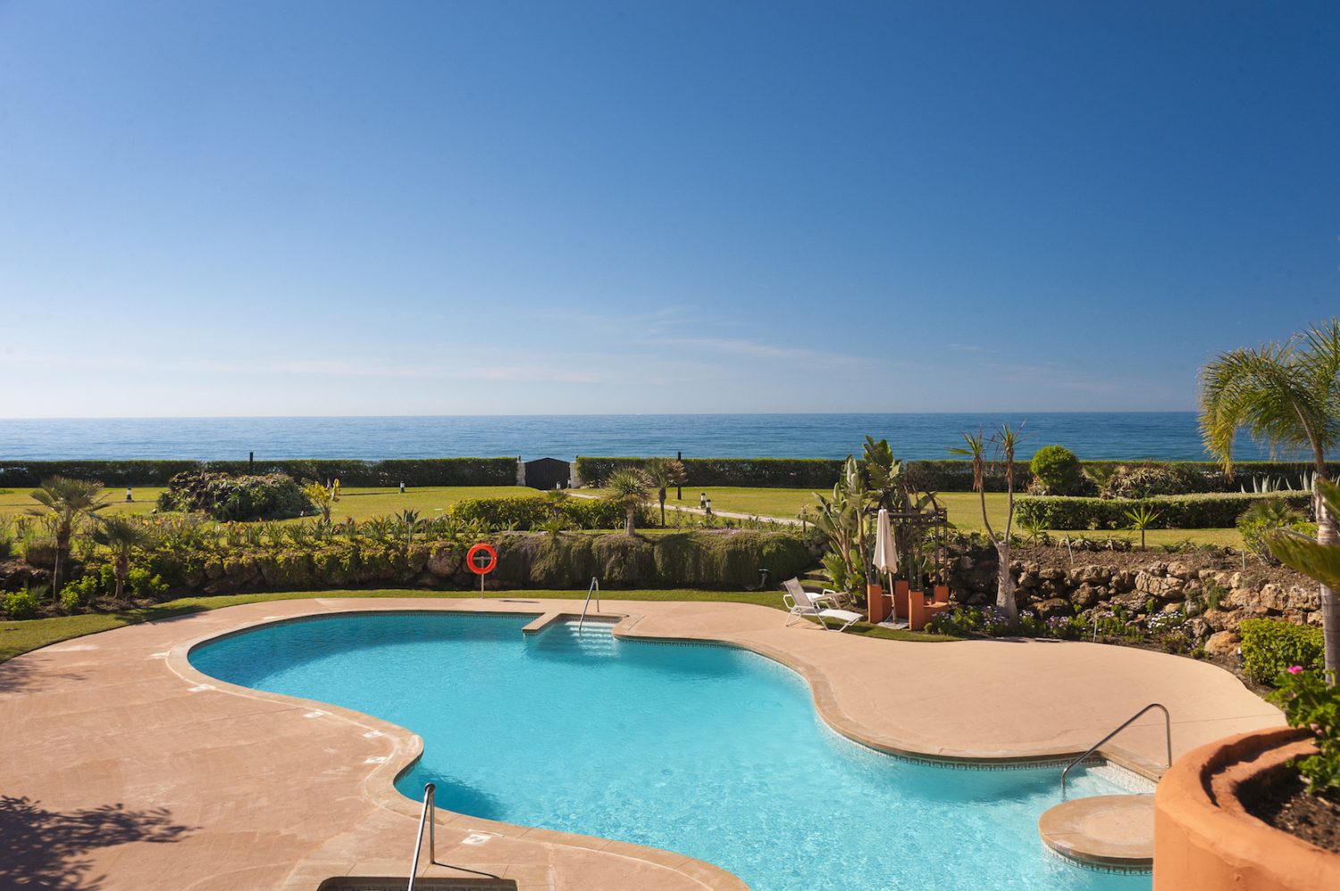 view to sea from pool image luxury first line beach apartments los monteros