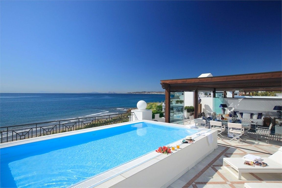 image of swimming pool and view from new luxury apartments and penthouses estepona